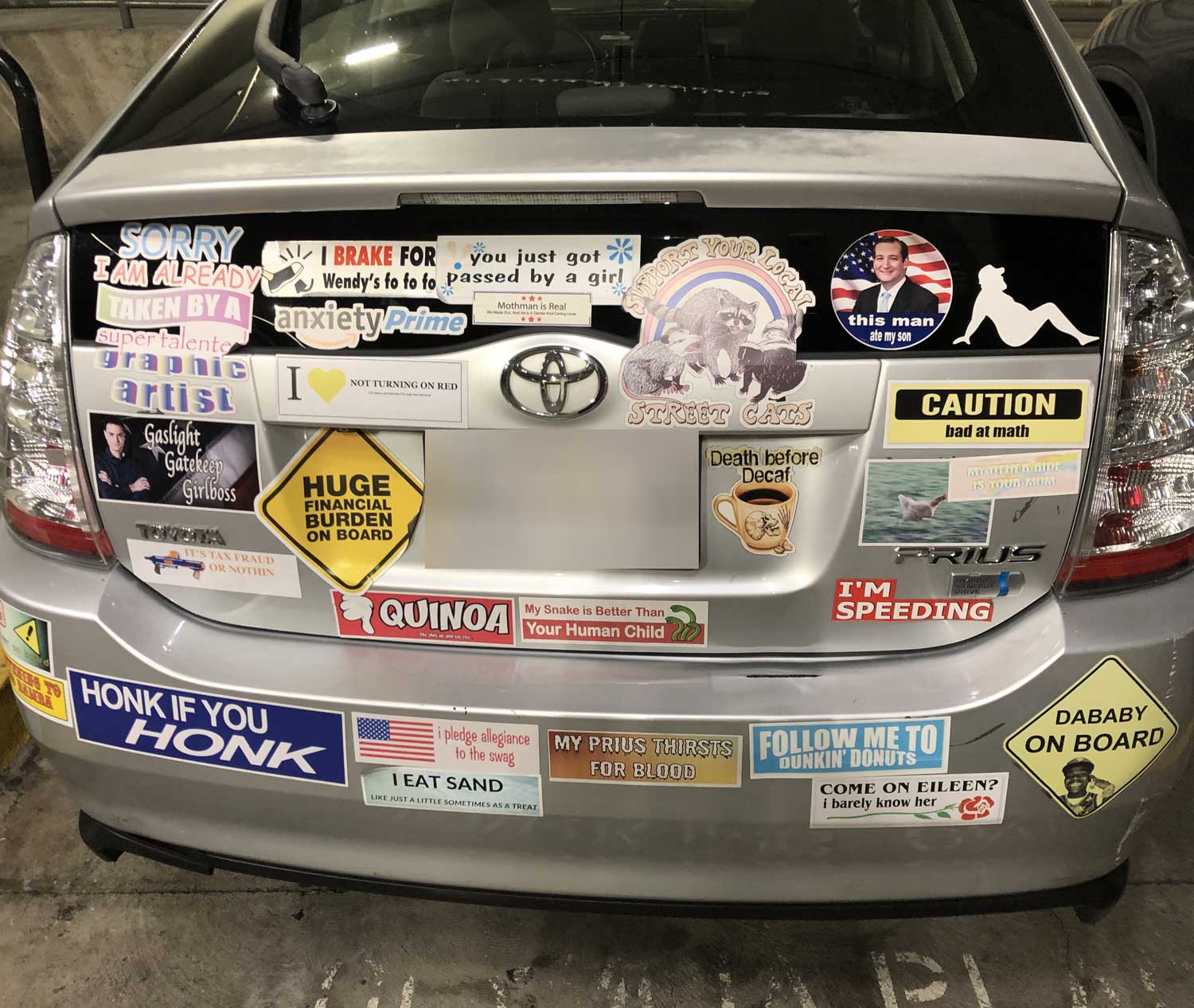 The stickers on the back of this Toyota Prius