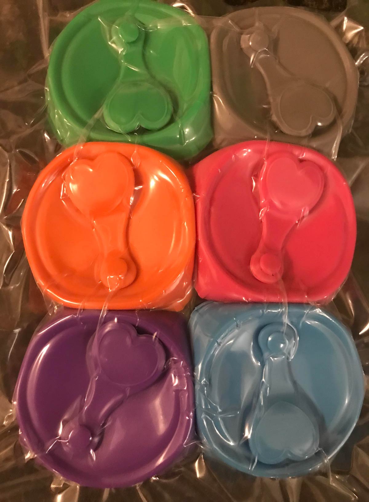My wife bought silicone lids with love hearts on!