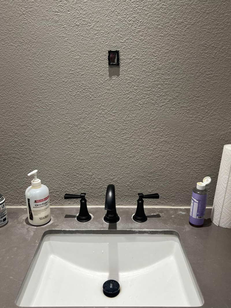 This tiny bathroom mirror