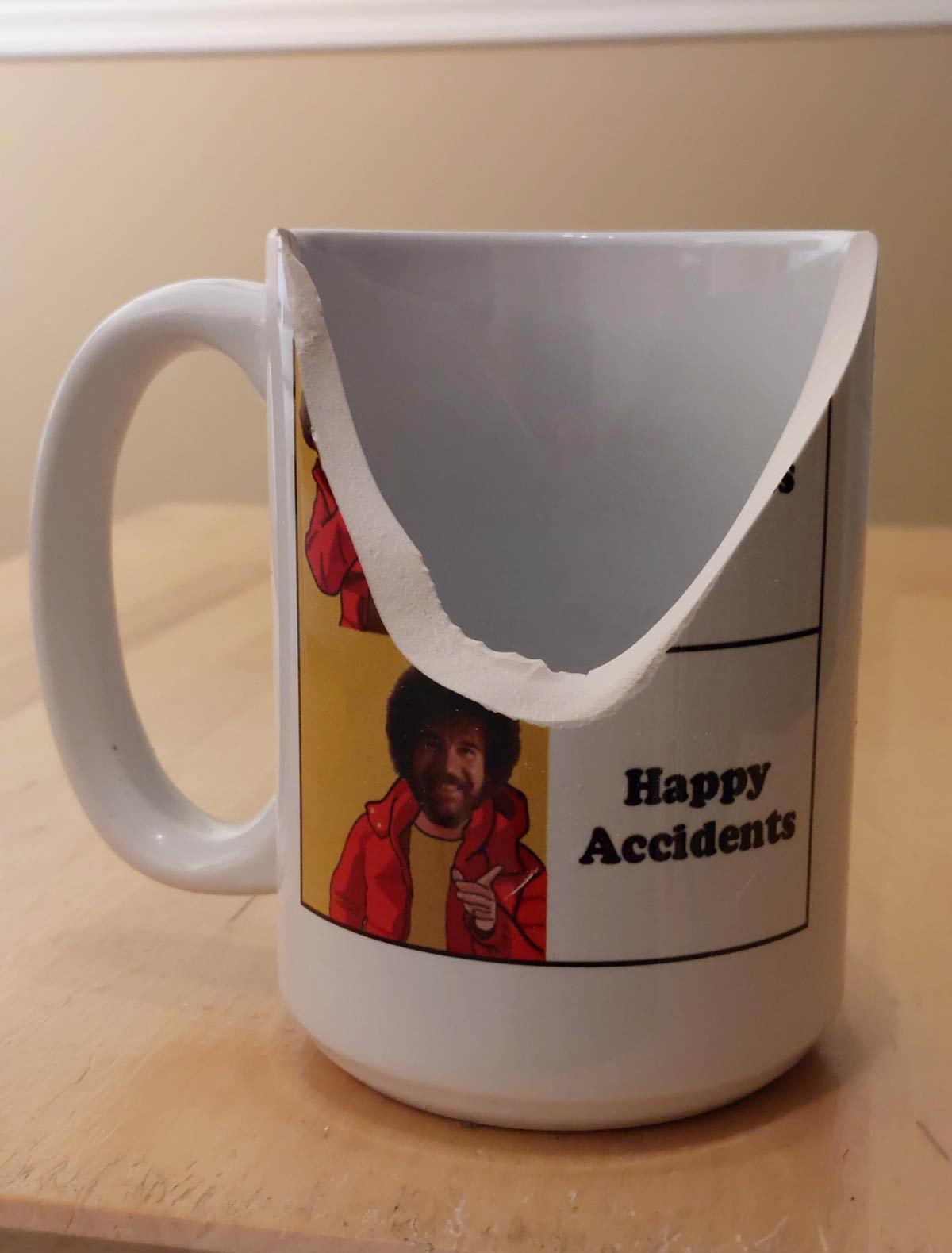 I dropped my Bob Ross coffee mug. The irony isn't lost on me