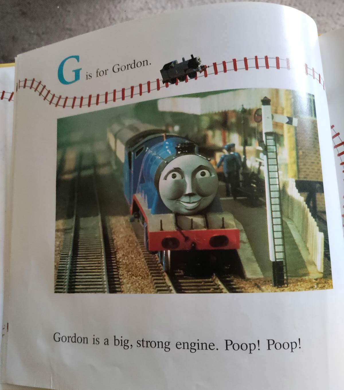 A Thomas the Tank Engine book from my childhood which used the word "poop" as an onomatopoeia. My brother and I would always giggle like idiots when our mom read it to us