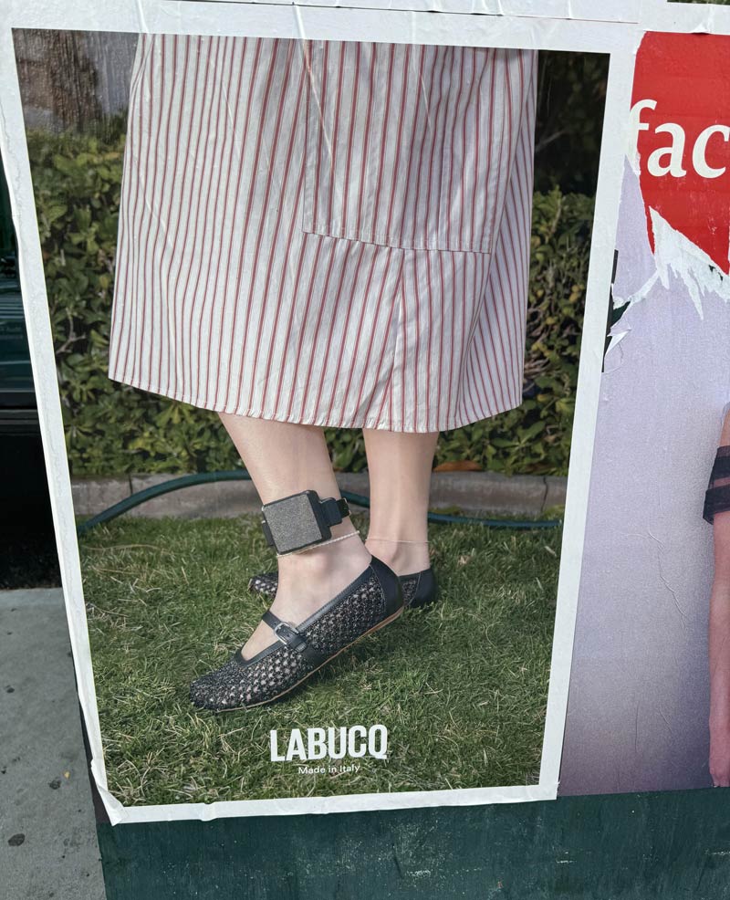 Footwear ad with an ankle monitor