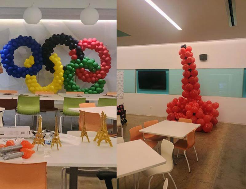 Paris-themed Olympics party. The volunteers did a fantastic job with the Olympic Rings balloon sculpture, but probably should have skipped the Eiffel Tower...