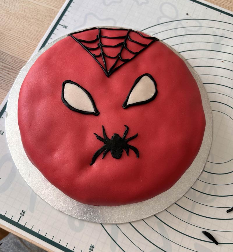 My wife baked a Spider-Man cake that looks like it wants to invade Poland