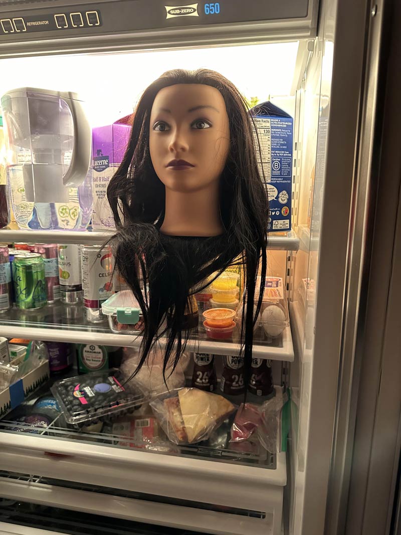 Roomie asks me to get a head of lettuce from the fridge... this awaits me as I open it