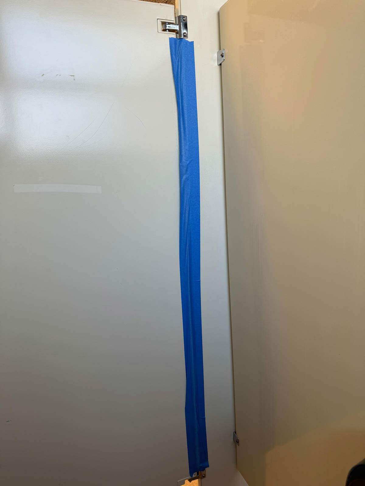 Someone in my office put painters tape in the bathroom stall so no one would see him pooping