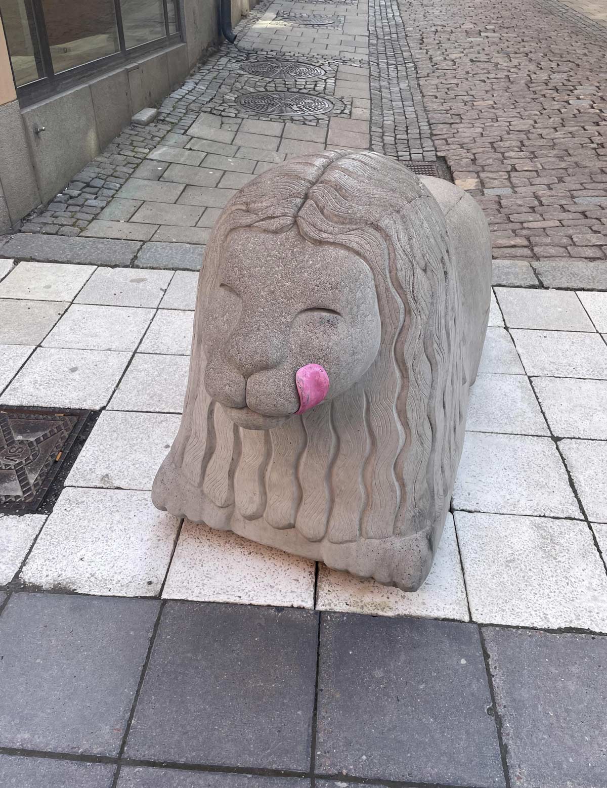 Someone added a tongue to this road block in Stockholm, Sweden