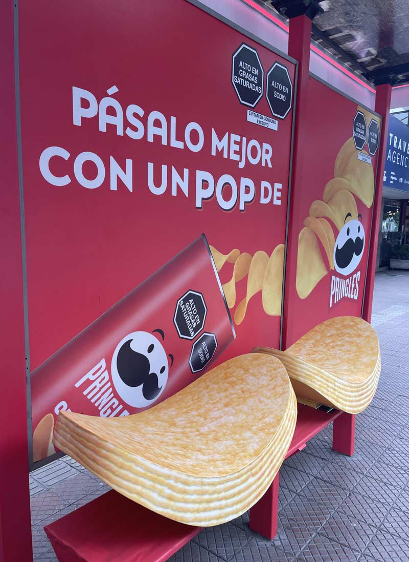 Pringle shaped seats at a bus stop in Lima