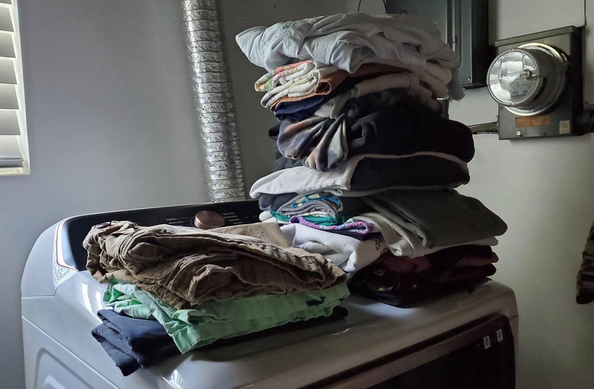 Ratio of my wife's clothes to my clothes in a load of laundry