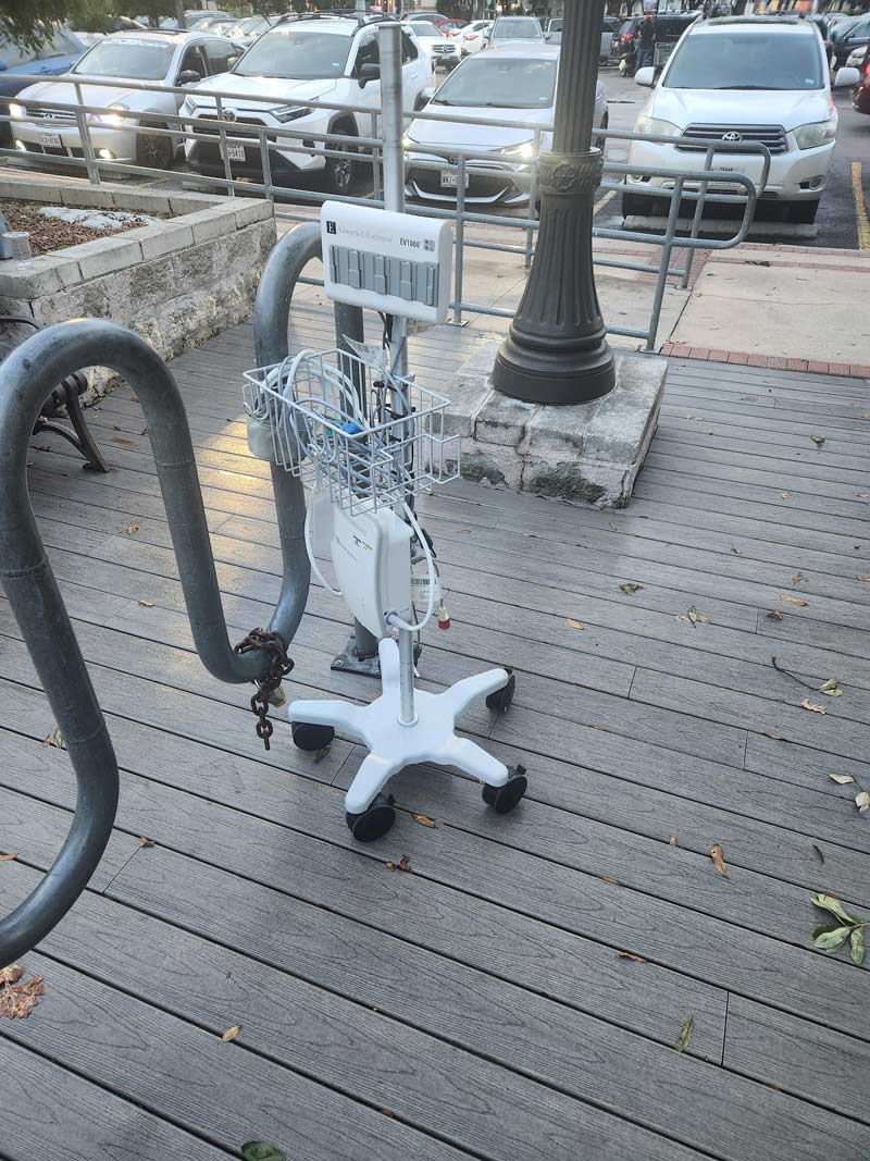 Someone ran out of the hospital and parked their blood pressure monitor on our bike rack