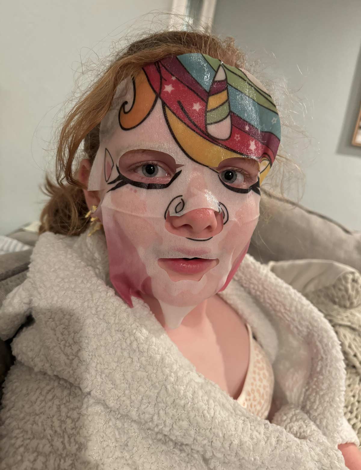 My daughter looks like Hannibal Lecter wearing someone’s face. It’s a unicorn face mask