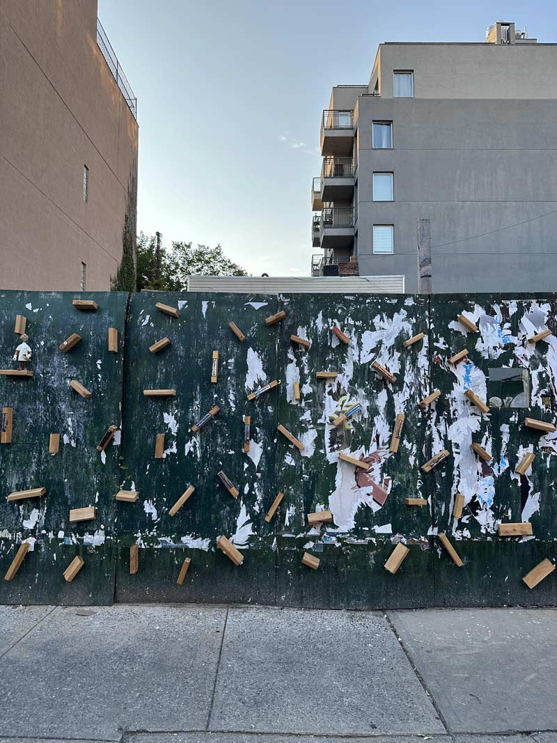 Construction fence in my neighborhood had a bunch of 2x4’s nailed to prevent poster hanging