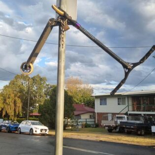 One of my co-workers' house was "rocked" last night. He ran out of his house to chase the kids that did it but they fled, leaving their scooter behind. This is what he did with the scooter this morning