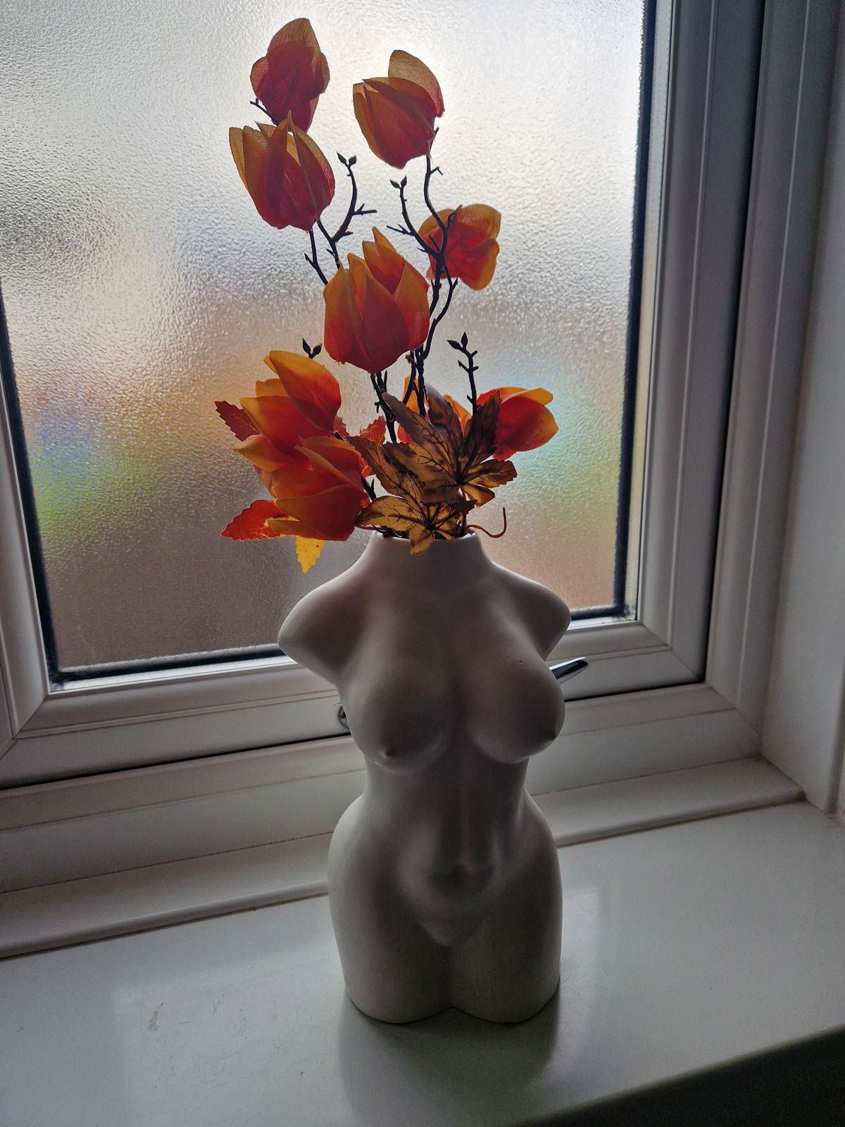 My mother's vase and flowers, looking like an extra from The Last of Us