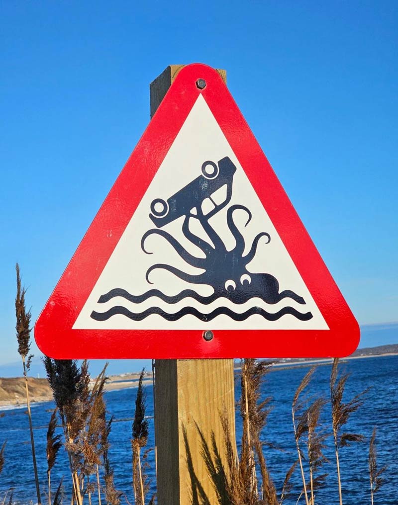 This is an actual street sign where I live (it's a very tiny tourist island with very few permanent residents)