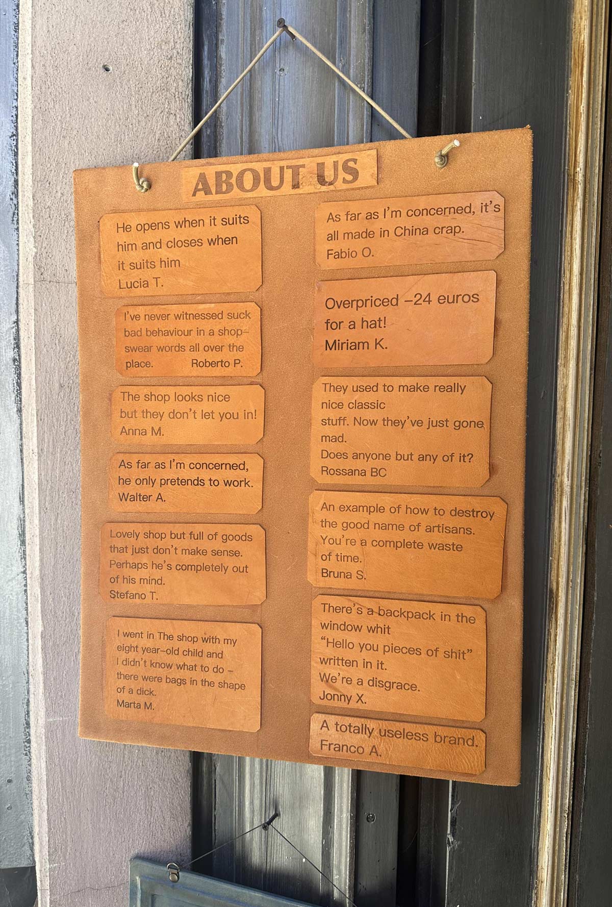 Cheeky leather shop in small Italian town posted its reviews outside the door