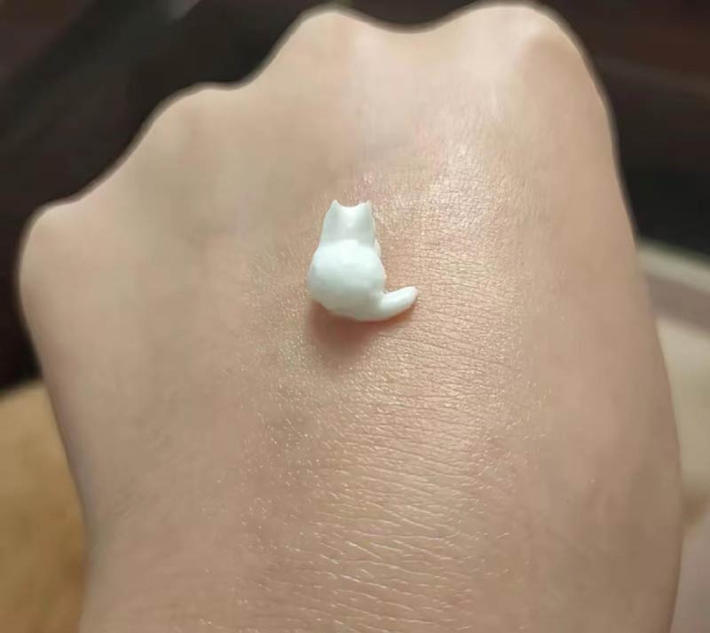 I squeezed my hand cream, and out came a tiny cat