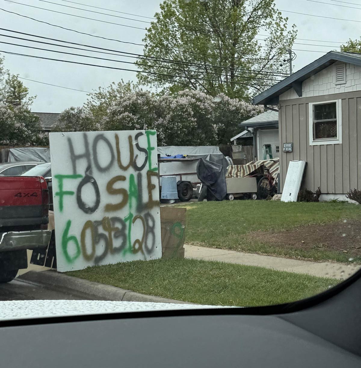 Local hoarder house that always has police stopping by must have a good realtor