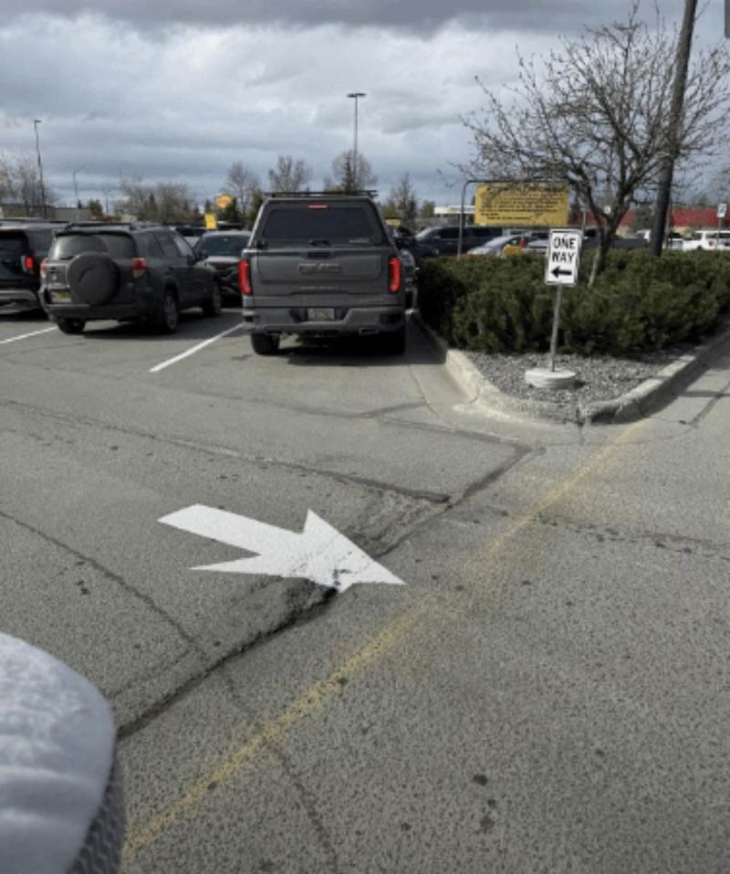 COSTCO freshly painted arrow is showing the wrong direction