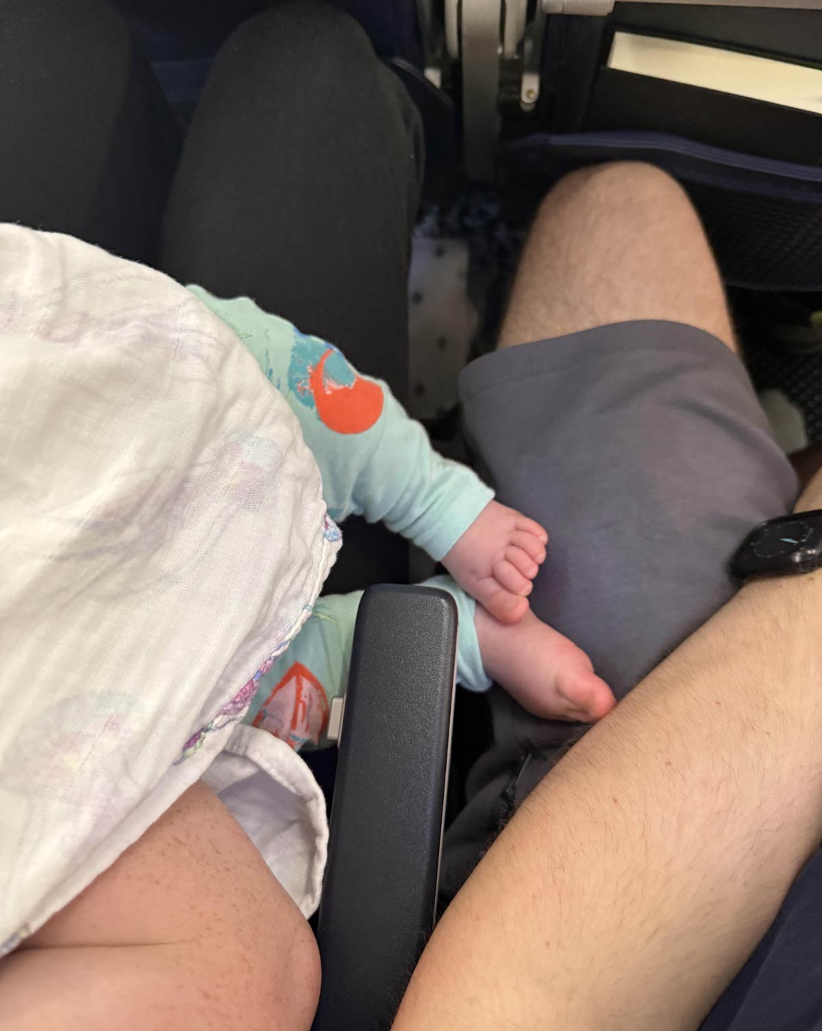On a flight and a passenger keeps putting his bare feet on me