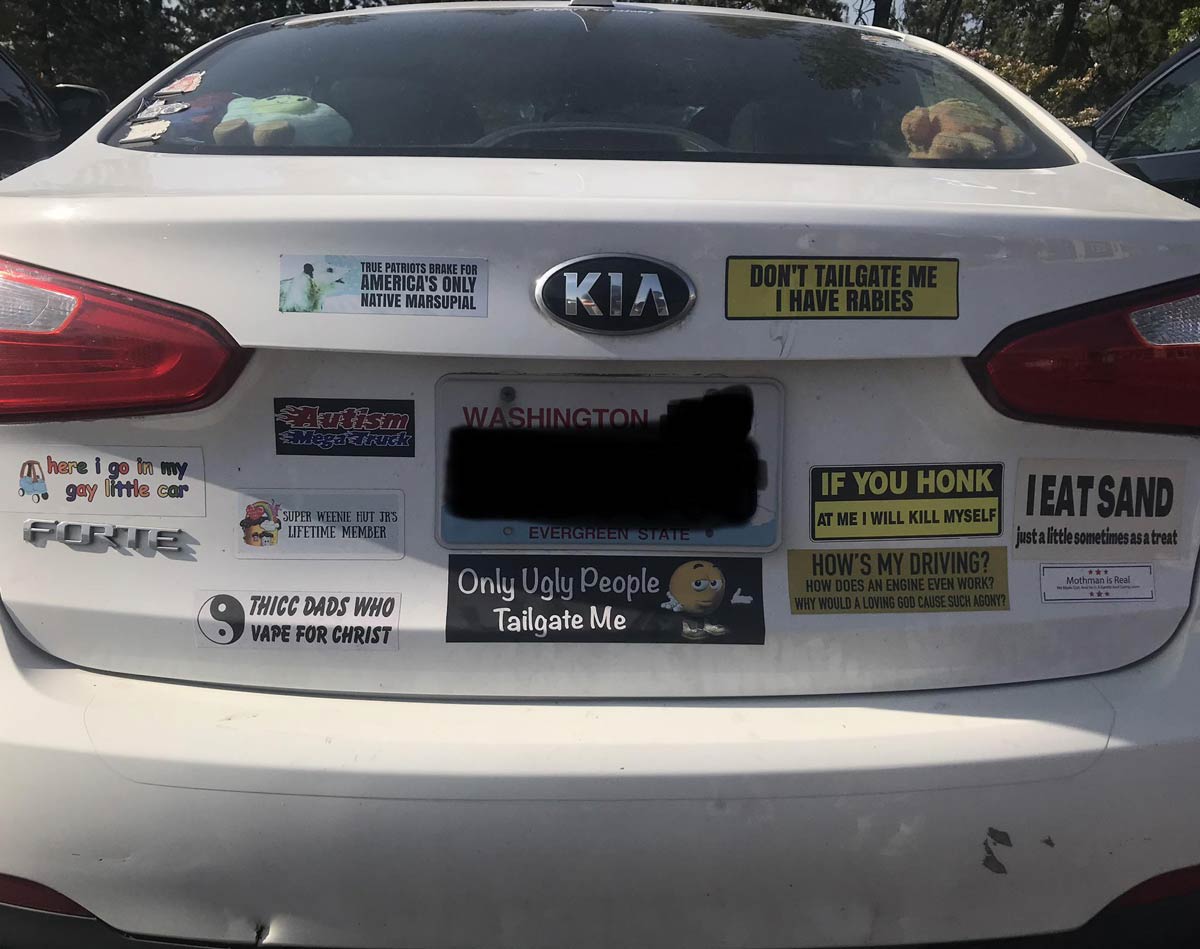 Car in Target parking lot with best bumper stickers I’ve ever seen