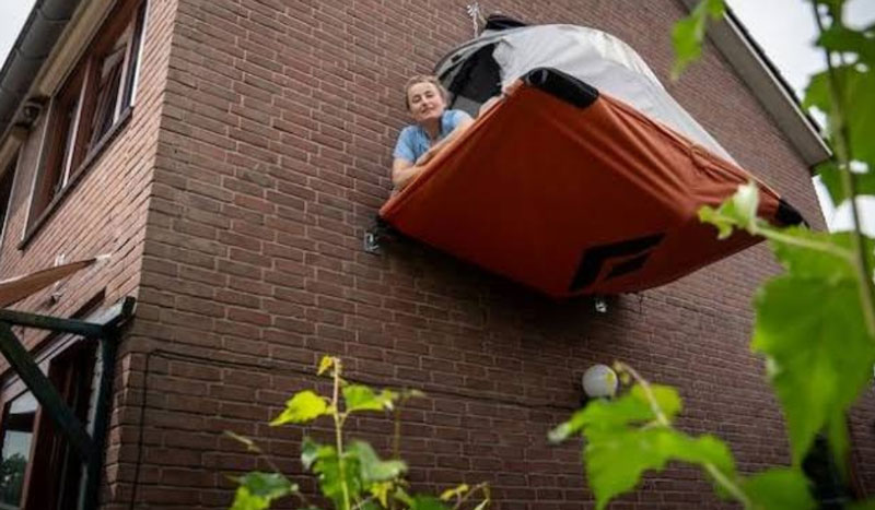 Different take on Airbnb in the Netherlands. You can hire this tent for 30 euros a night and hang outside her house on the wall, high and dry