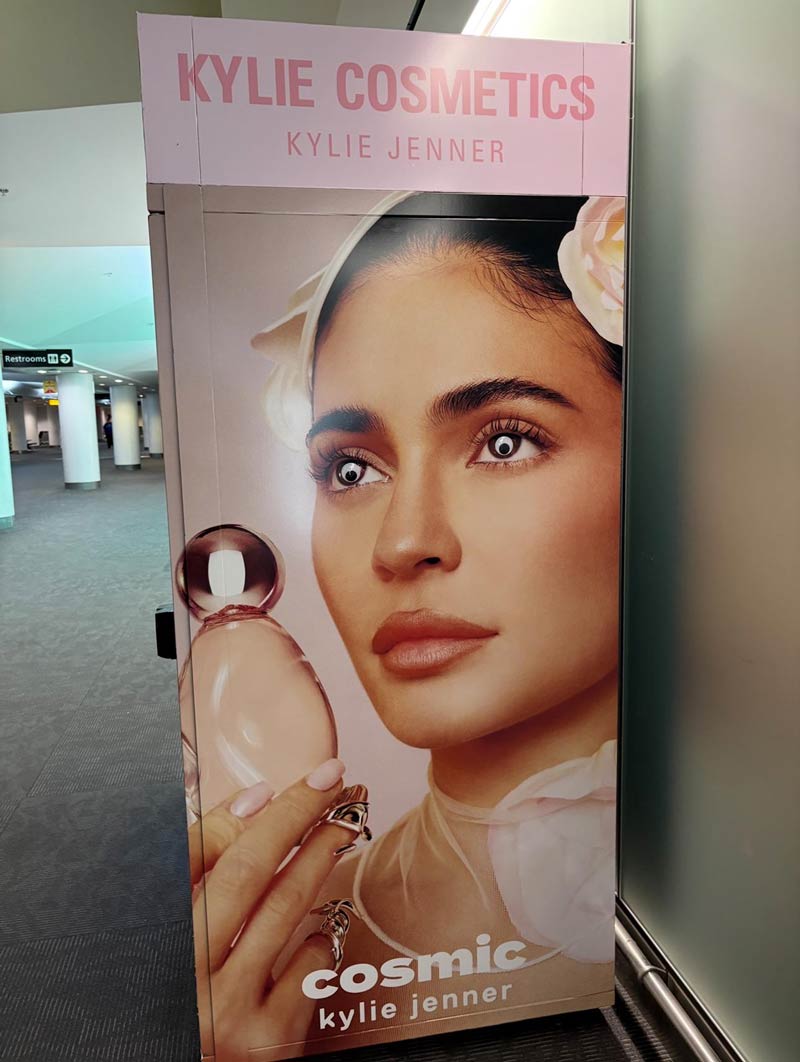 Kylie Jenner cosmetics vending machine with googly eyes, BWI airport