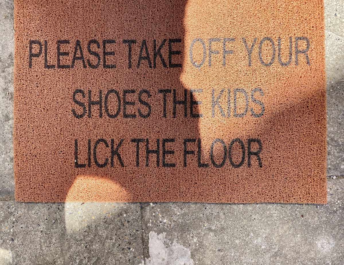 Please take off your. Shoes the kids. Lick the floor