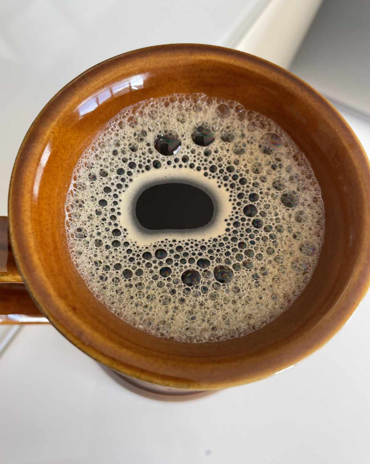 My coffee with a concerned expression